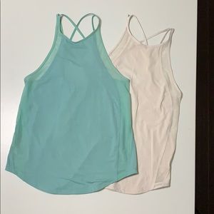 2 Lululemon Run Off Route tanks size 4